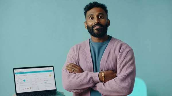 Startup founders analyzing AI data on a holographic interface, symbolizing innovation and cost-effective technology adoption for business growth.
