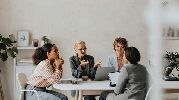 Diverse women in agriculture leadership roles, demonstrating innovation and collaboration in a modern farm setting.
